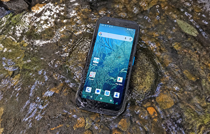 TC605 rugged handheld in wet and muddy conditions